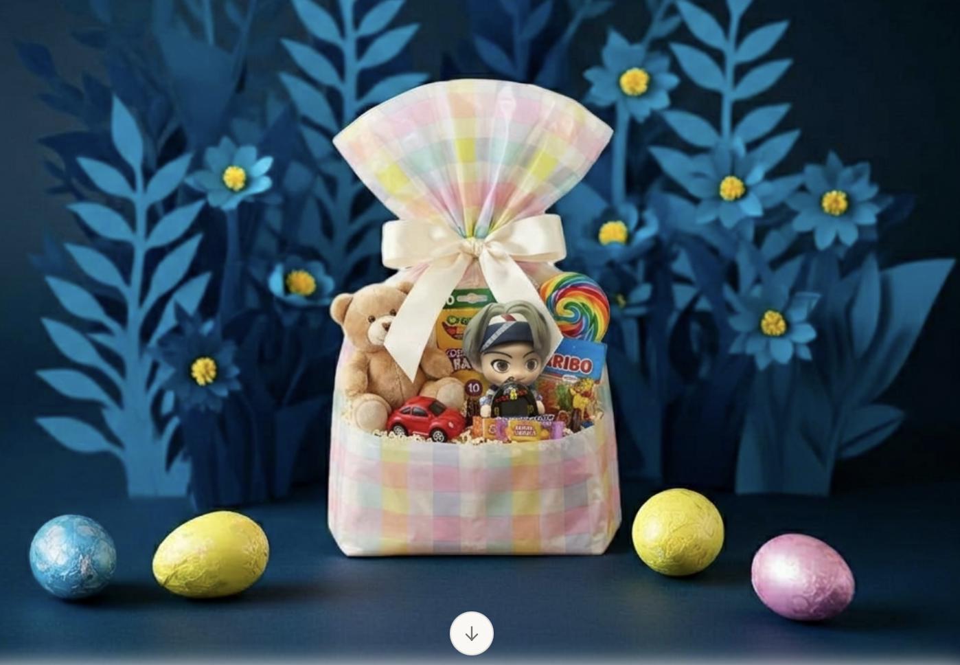 Gift basket with candy, BTS figure and mini tomagotchi