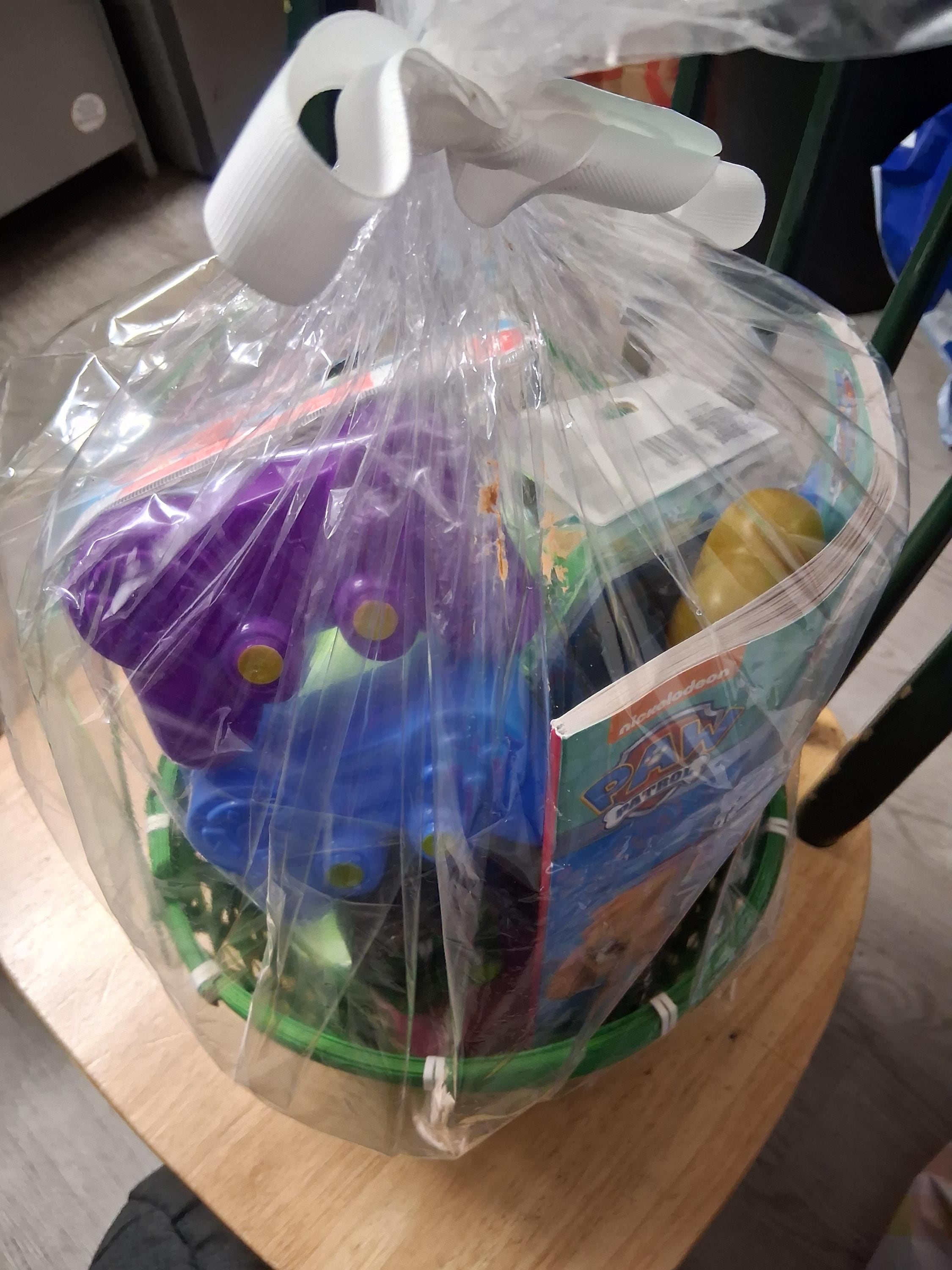 Gift basket with candy, BTS figure and mini tomagotchi
